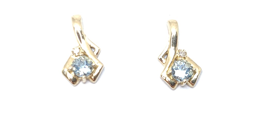 Yellow gold, aquamarine, and tot of 1 dia pt fixed earrings