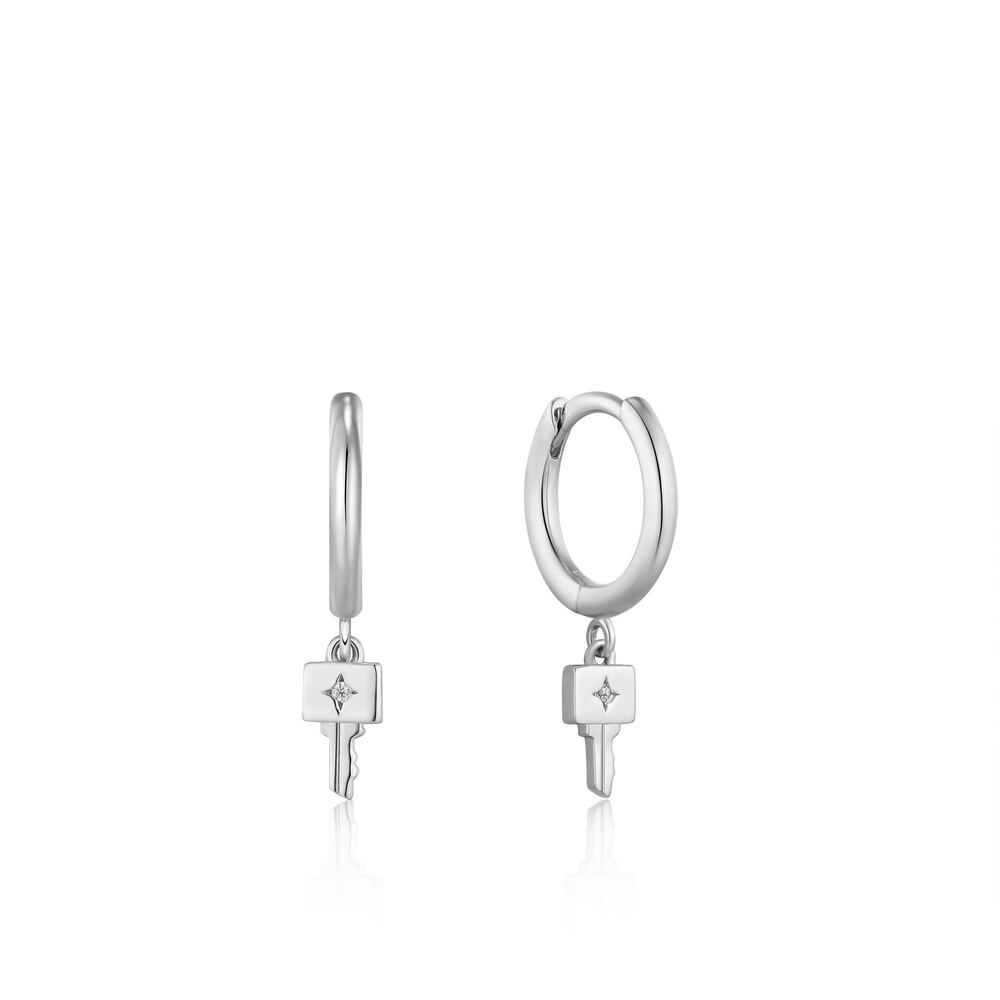 Rhodium-plated silver key-shaped huggies with cubic zirconia