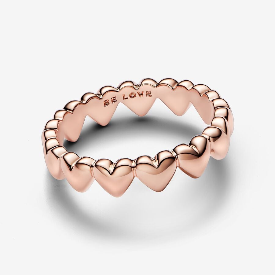 Heart row ring in unique metal plated with 14k rose gold