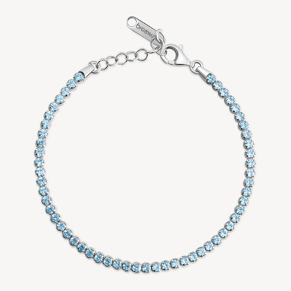 Rhodium-plated sterling silver tennis bracelet with blue cubic zirconia