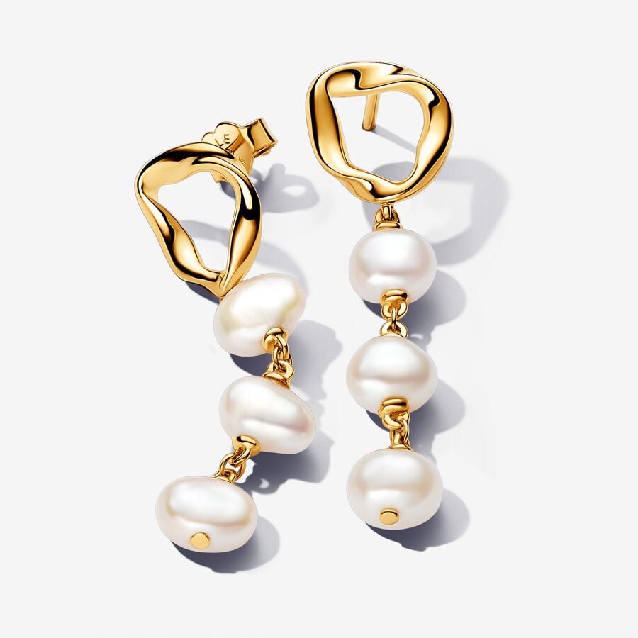 Dangling earrings with unique metals plated with 14-karat gold, freshwater pearls