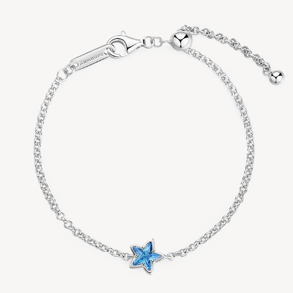 Rhodium-plated sterling silver star bracelet with blue zirconia