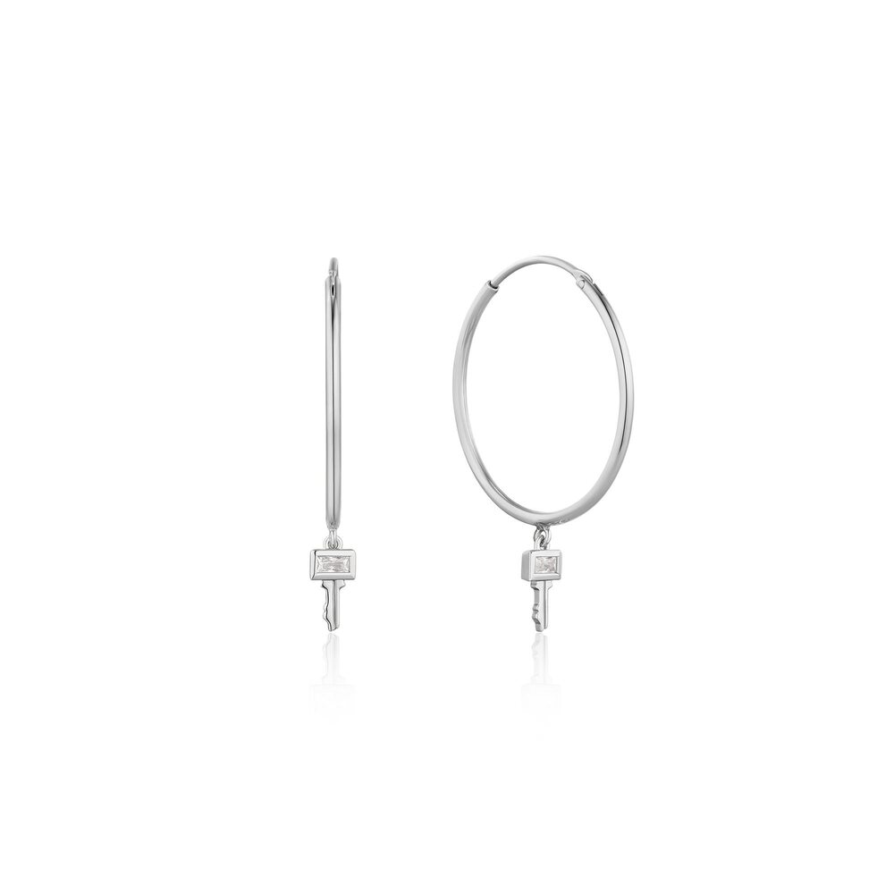 Key-shaped hoops in rhodium-plated silver with cubic zirconia