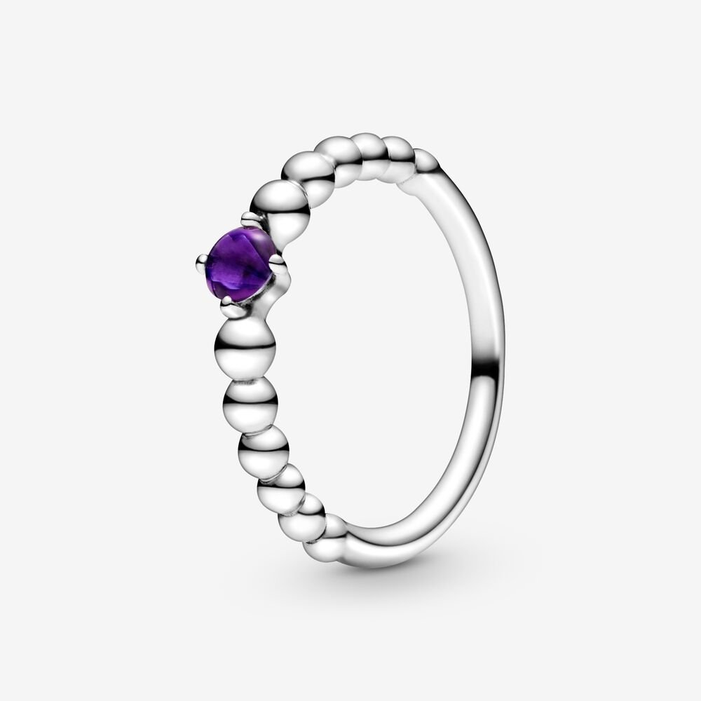 Bague perlé mauve, topaze traitée