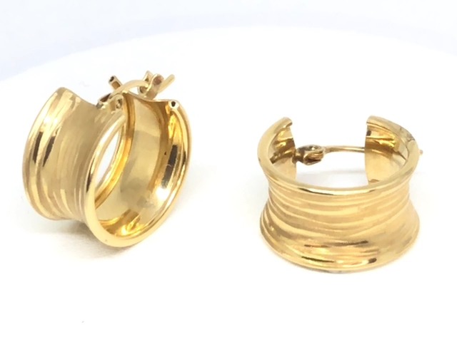 Yellow gold textured thick hoop earrings