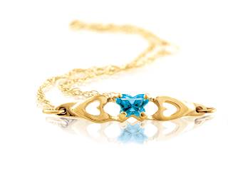 Yellow gold december butterfly bracelet with cz